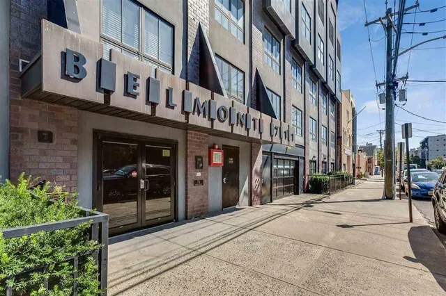 a view of a building with a street