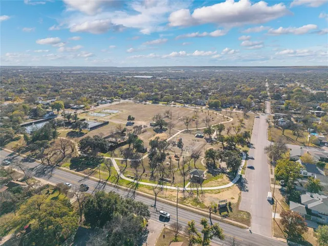 an aerial view of residential building with parking space