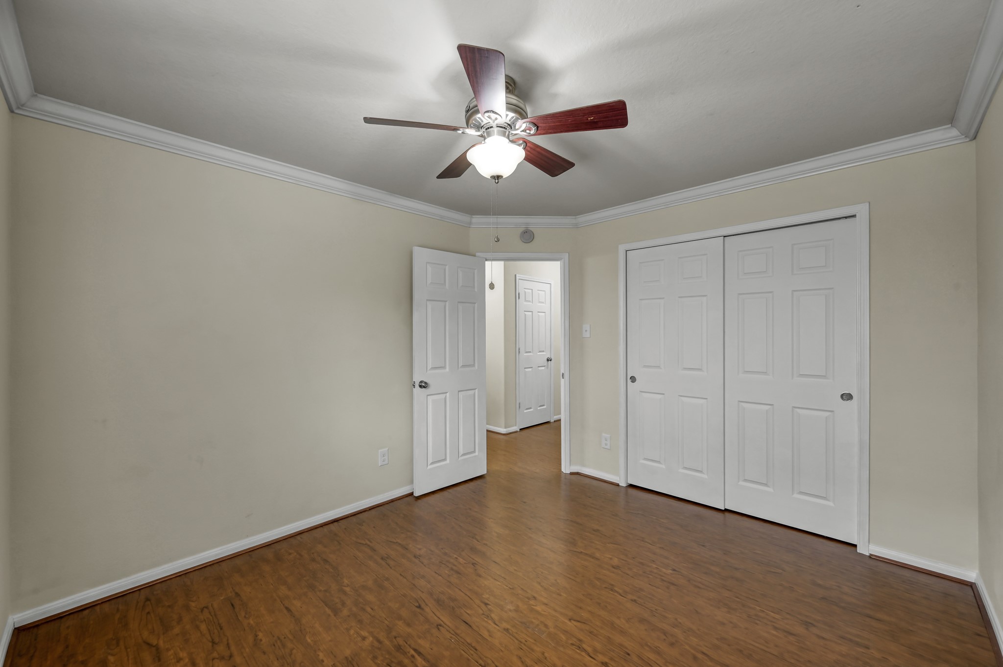 631 Timberstand Lane Spring, TX 77373 - Photo 27 of 38 A spacious secondary bedroom with no carpet and a large closet provides comfort and easy everyday living.