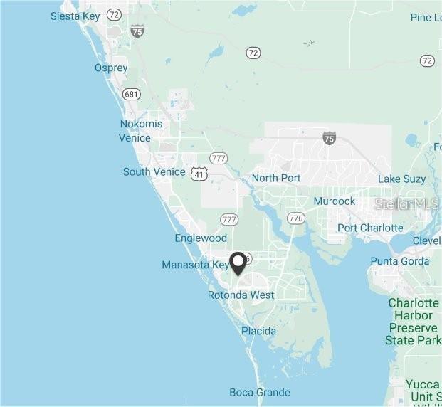 224 Sunset Road Rotonda West, FL 33947 - Photo 8 of 8 a bathroom with a tub