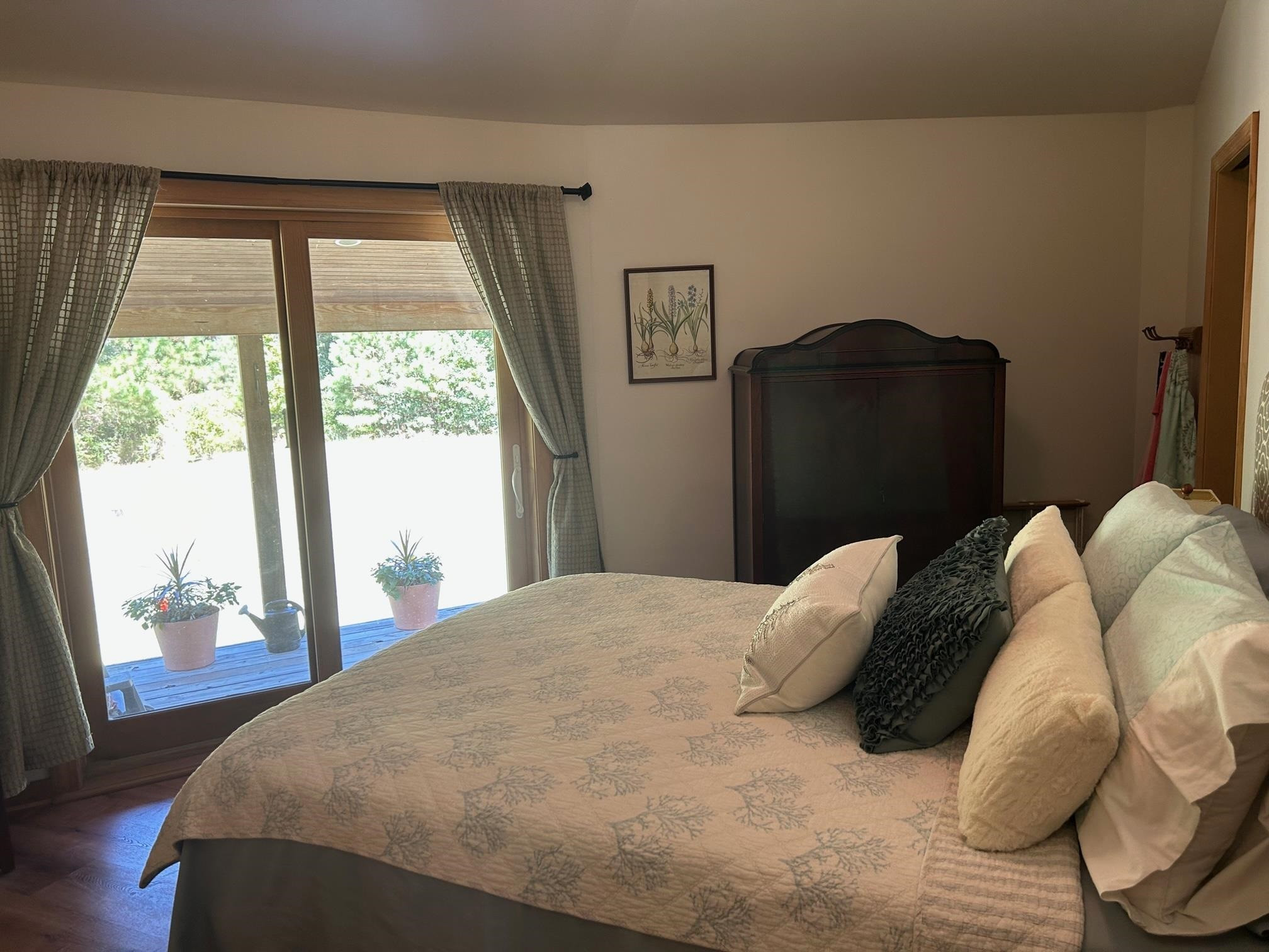 135 Barnhill Road Ivanhoe, NC 28447 - Photo 8 of 23 a bedroom with a bed and window