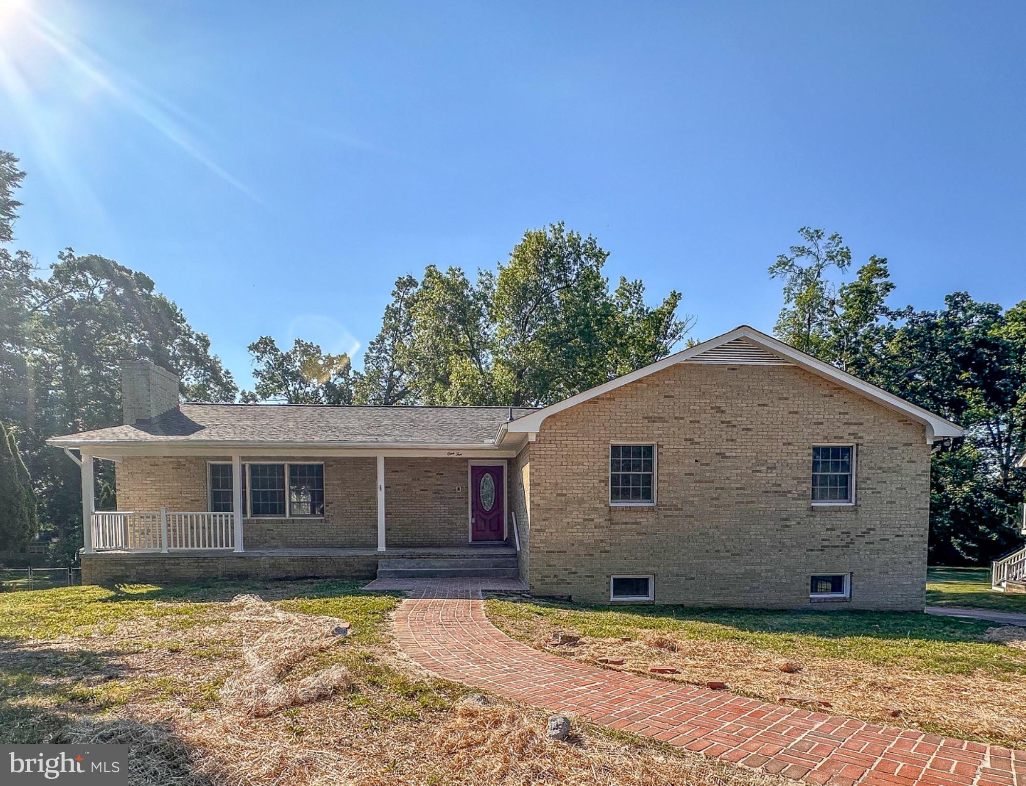 110 Russellcroft Road Winchester, VA 22601 - Photo 1 of 31 Charming brick home with inviting path.