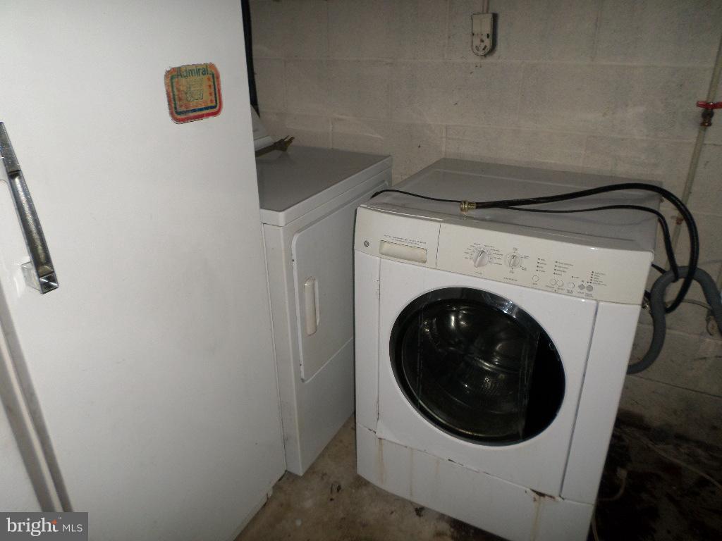 3407 Santee Road Baltimore, MD 21236 - Photo 13 of 22 a close up view of a washer and dryer