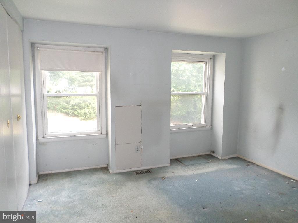 3407 Santee Road Baltimore, MD 21236 - Photo 14 of 22 an empty room with a window