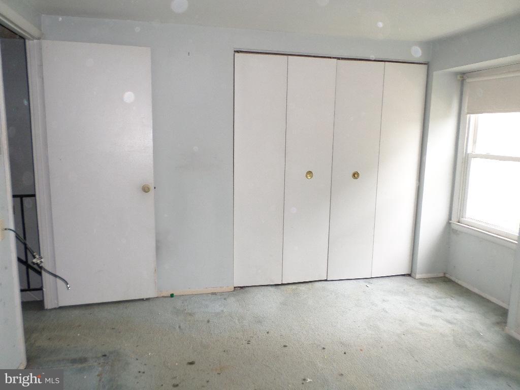 3407 Santee Road Baltimore, MD 21236 - Photo 15 of 22 an empty room with windows