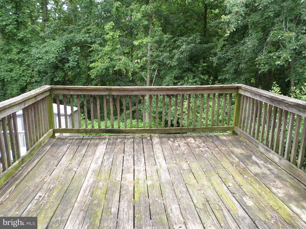 3407 Santee Road Baltimore, MD 21236 - Photo 21 of 22 a view of balcony with wooden floor