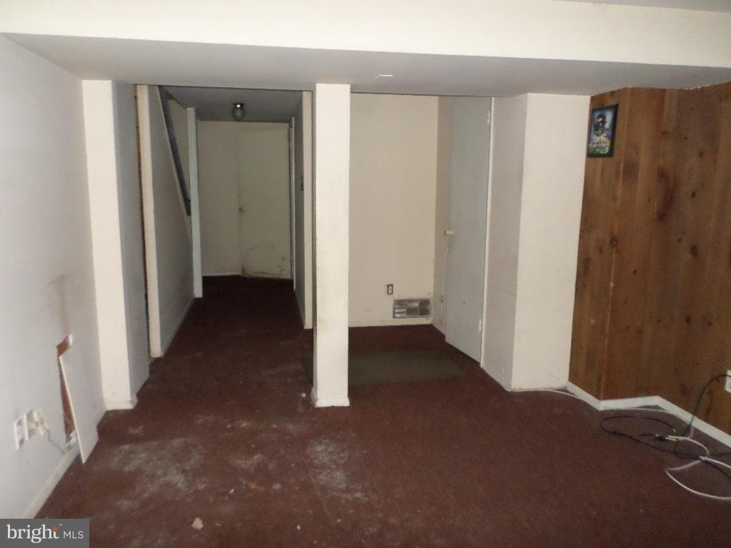 3407 Santee Road Baltimore, MD 21236 - Photo 10 of 22 a view of a room with a hallway