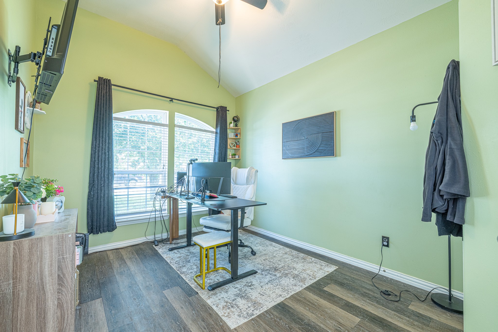 3818 Hunters Trail Baytown, TX 77521 - Photo 20 of 32 a view of a workspace with furniture and a window
