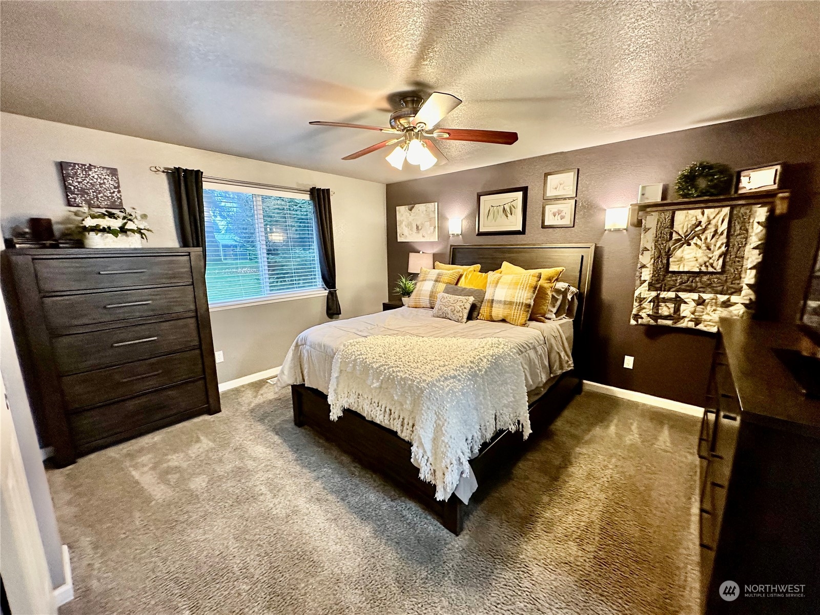 18120 Sunshine Lane Southwest Rochester, WA 98579 - Photo 19 of 39 a bedroom with a bed and dresser