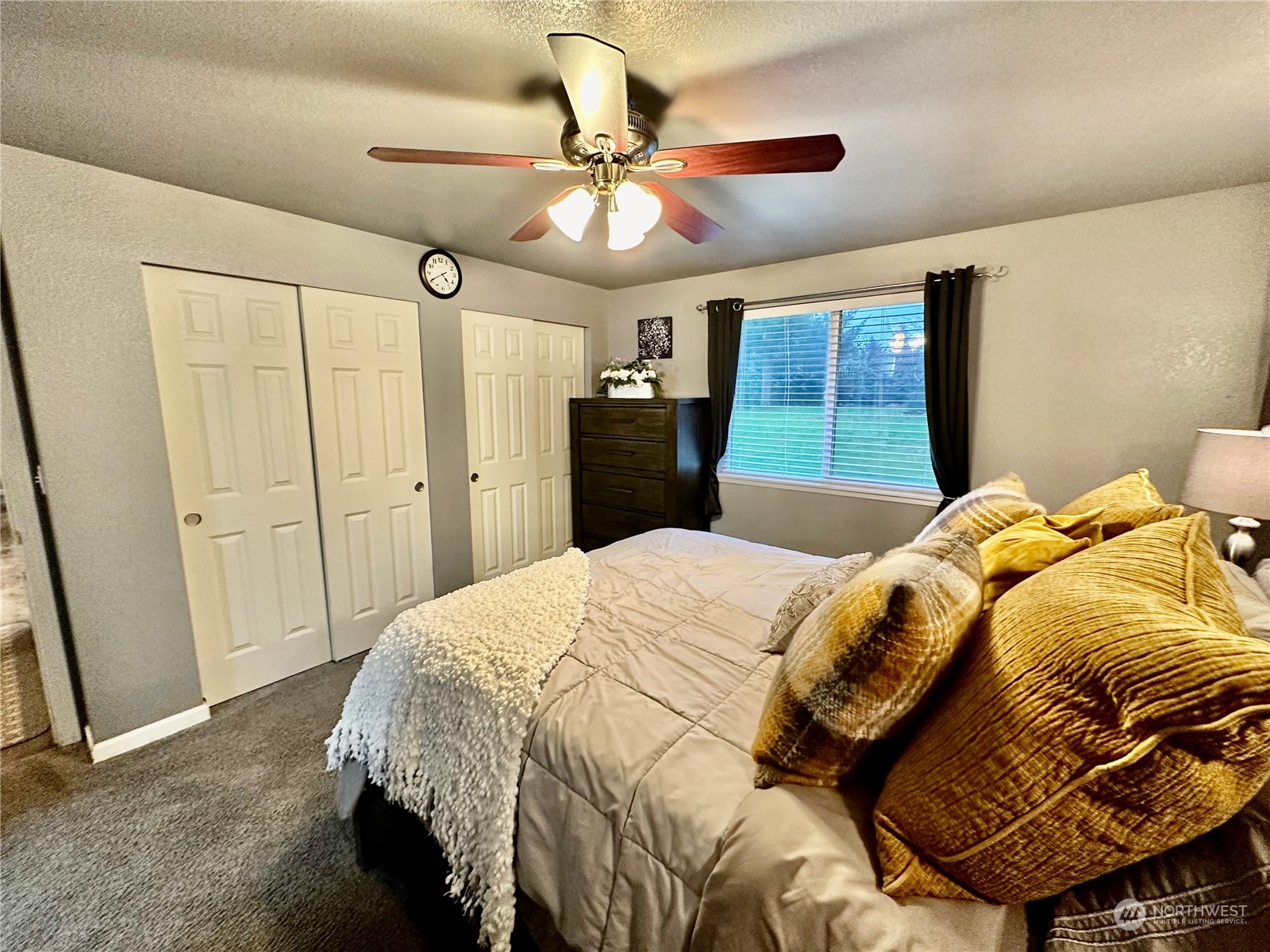 18120 Sunshine Lane Southwest Rochester, WA 98579 - Photo 20 of 39 a bedroom with a bed and a mirror