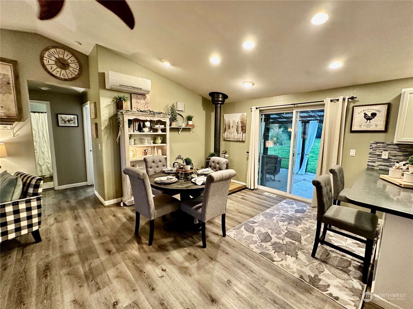 18120 Sunshine Lane Southwest Rochester, WA 98579 - Photo 23 of 39 a view of a very nice looking dining room with furniture window and wooden floor