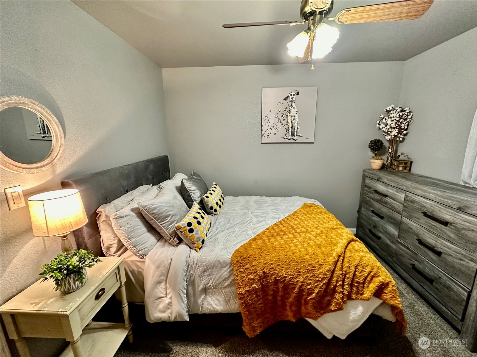 18120 Sunshine Lane Southwest Rochester, WA 98579 - Photo 24 of 39 a bedroom with a bed and a chandelier