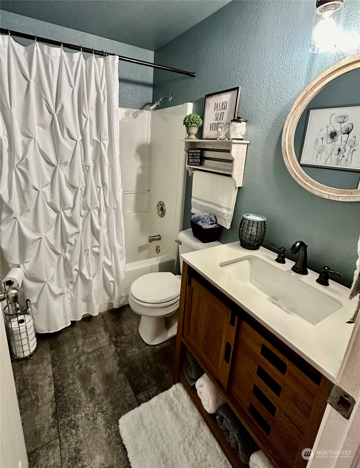 18120 Sunshine Lane Southwest Rochester, WA 98579 - Photo 26 of 39 a bathroom with a sink toilet and shower