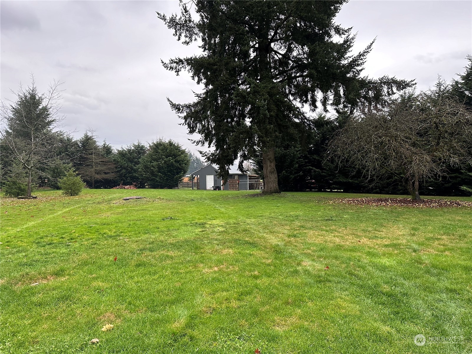 18120 Sunshine Lane Southwest Rochester, WA 98579 - Photo 32 of 39 a view of a garden and basketball court