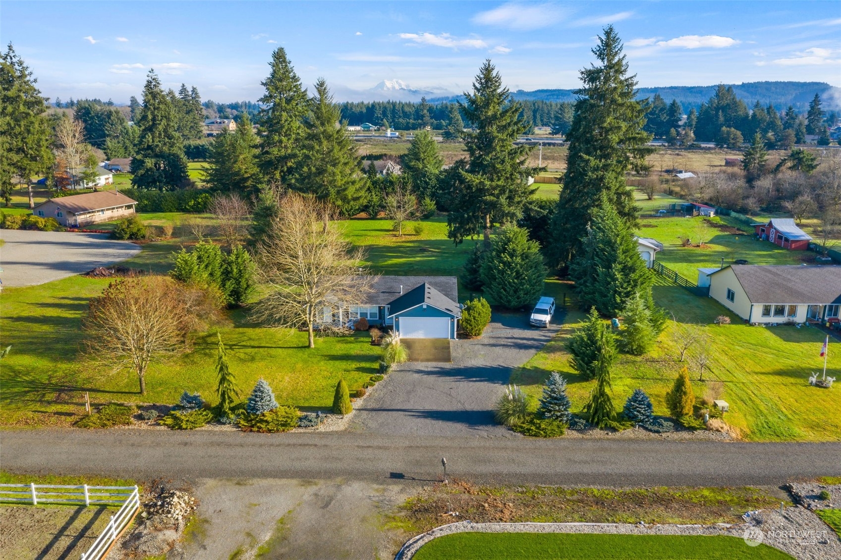 18120 Sunshine Lane Southwest Rochester, WA 98579 - Photo 36 of 39 a aerial view of a house with a yard basket ball court and outdoor seating