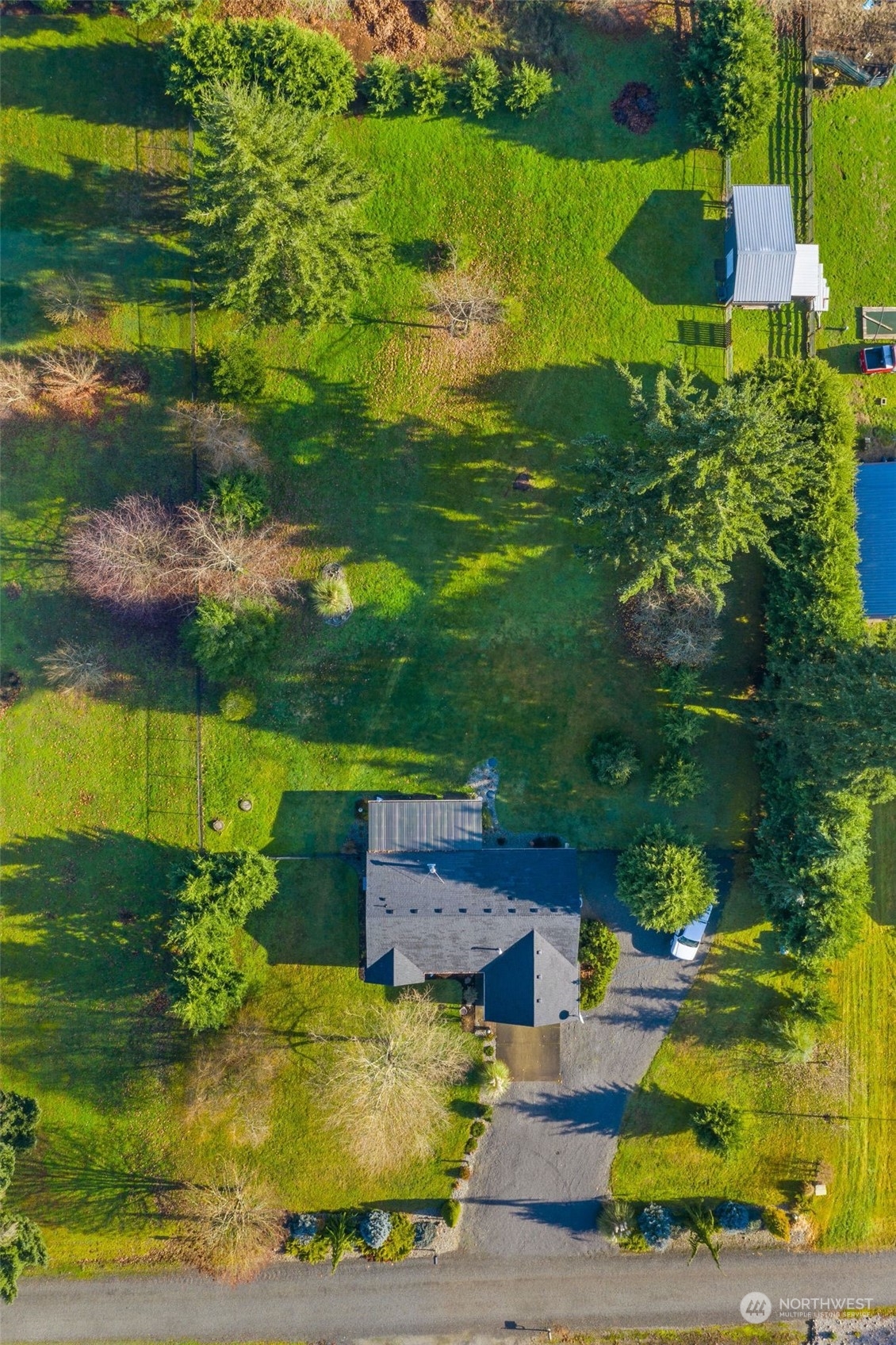 18120 Sunshine Lane Southwest Rochester, WA 98579 - Photo 39 of 39 an aerial view of a house with a yard lake lake view and mountain view