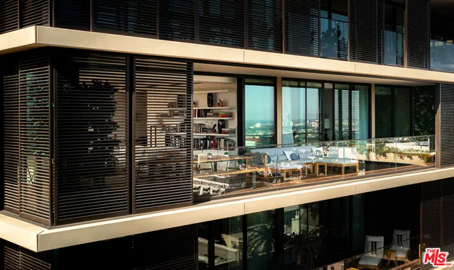 a bathroom with a sink and a large window