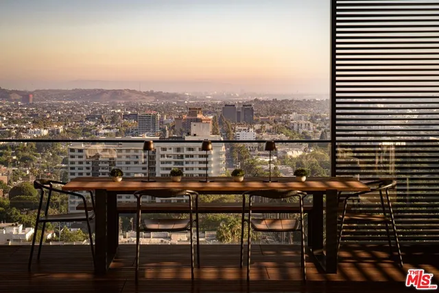 a view of a balcony with an ocean view