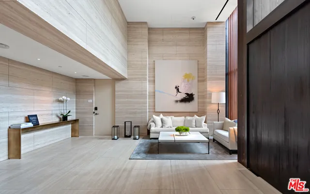 a view of a living room and dining room