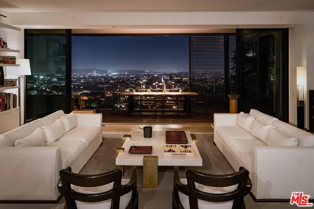 a outdoor dining space with furniture and window