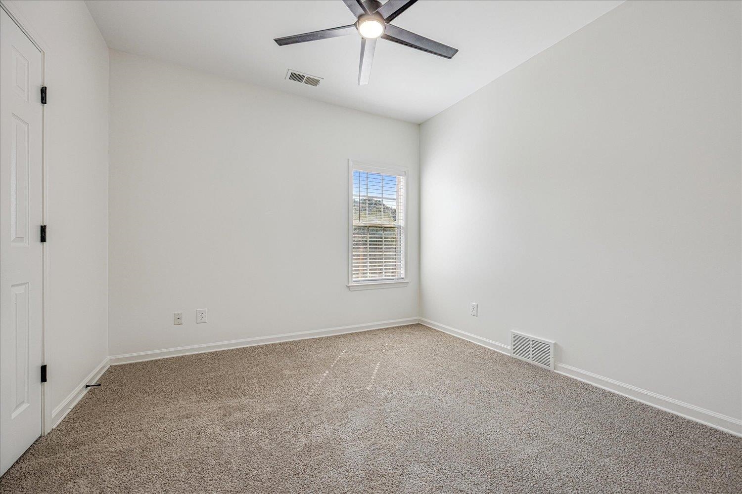 8453 Thor Road Memphis, TN 38018 - Photo 19 of 29 a view of an empty room with a window