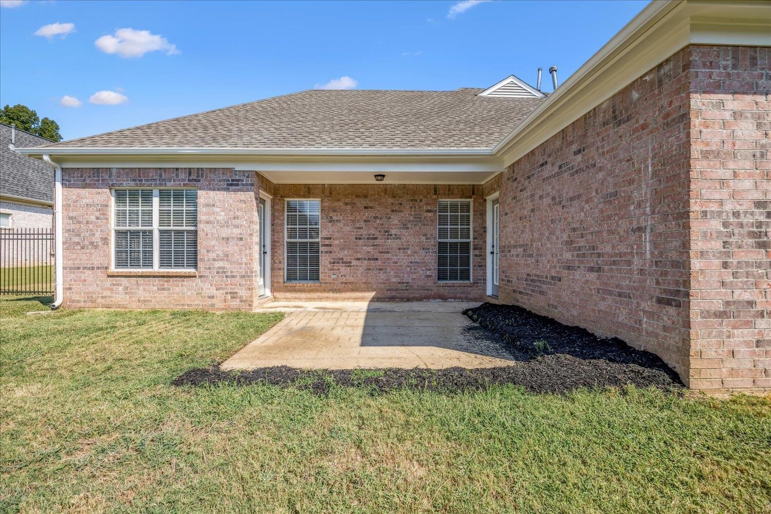 8453 Thor Road Memphis, TN 38018 - Photo 25 of 29 a front view of a house with garden
