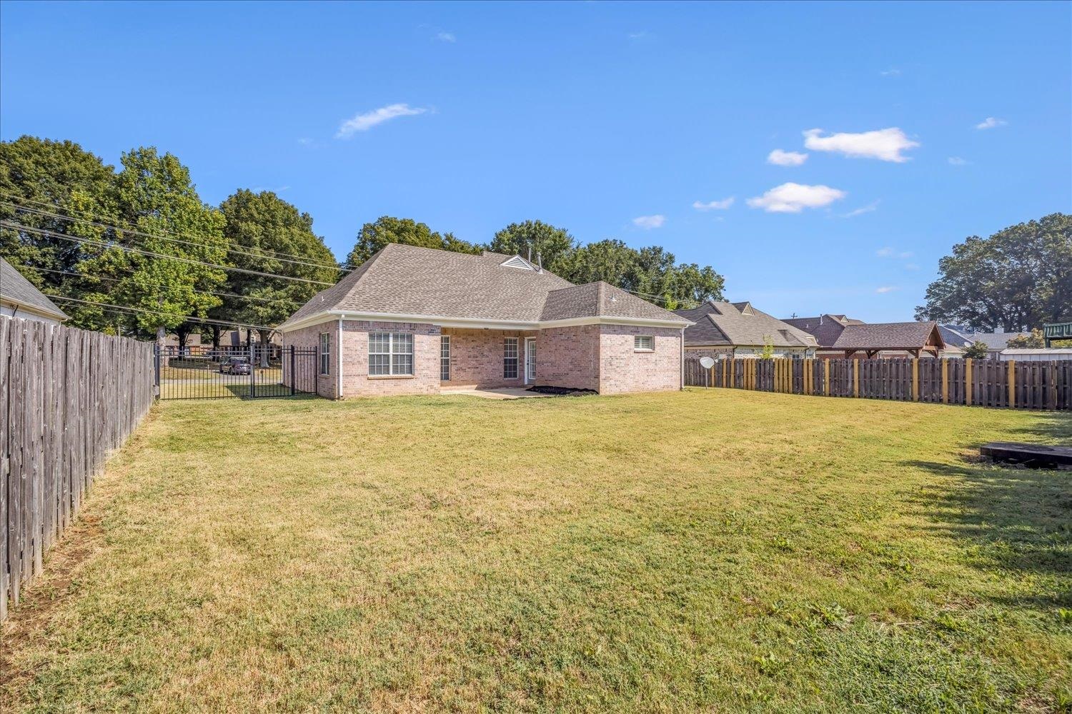 8453 Thor Road Memphis, TN 38018 - Photo 26 of 29 a house view with swimming pool in front of it