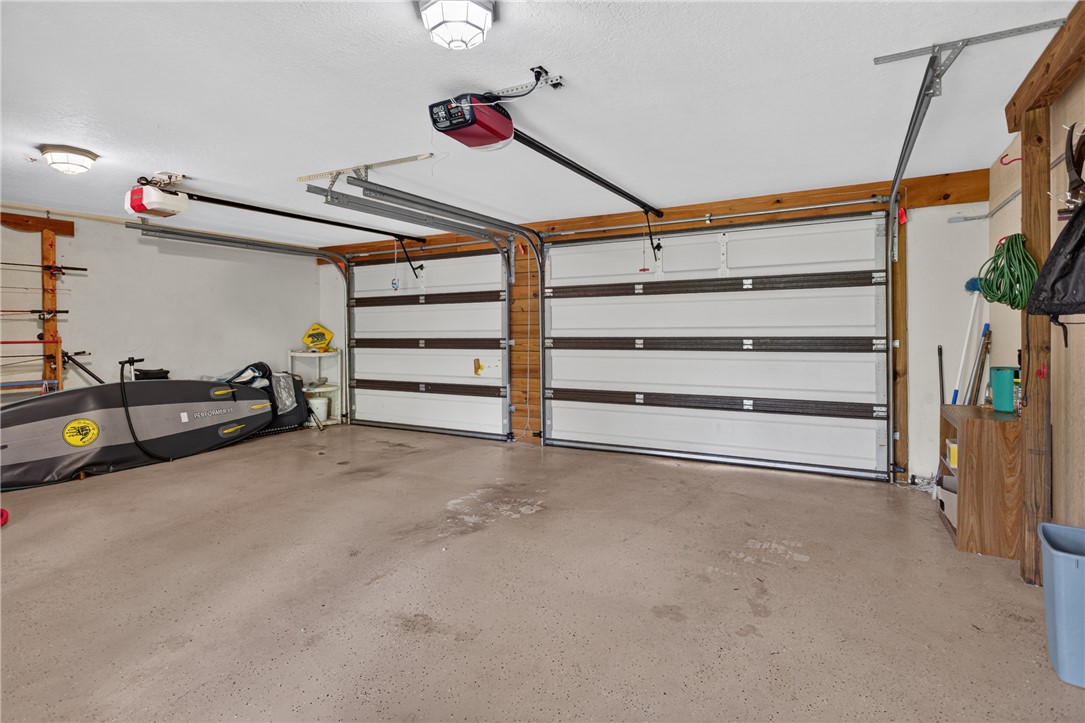 351 River Road Westminster, SC 29693 - Photo 39 of 50 Two garage doors offer convenient vehicle access and ample storage space.