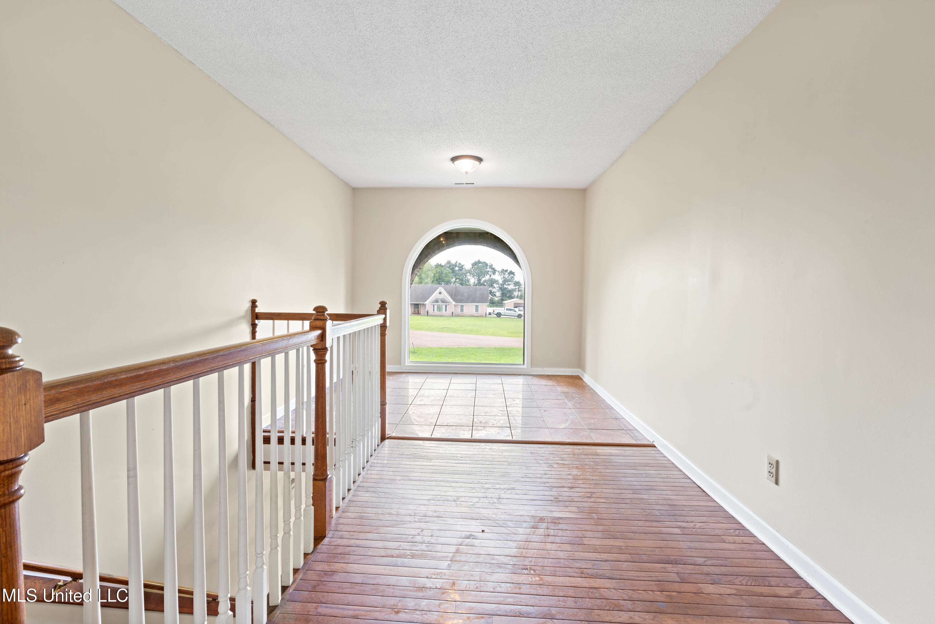 10668 Stark Acres Road Olive Branch, MS 38654 - Photo 12 of 22 Upstairs Foyer