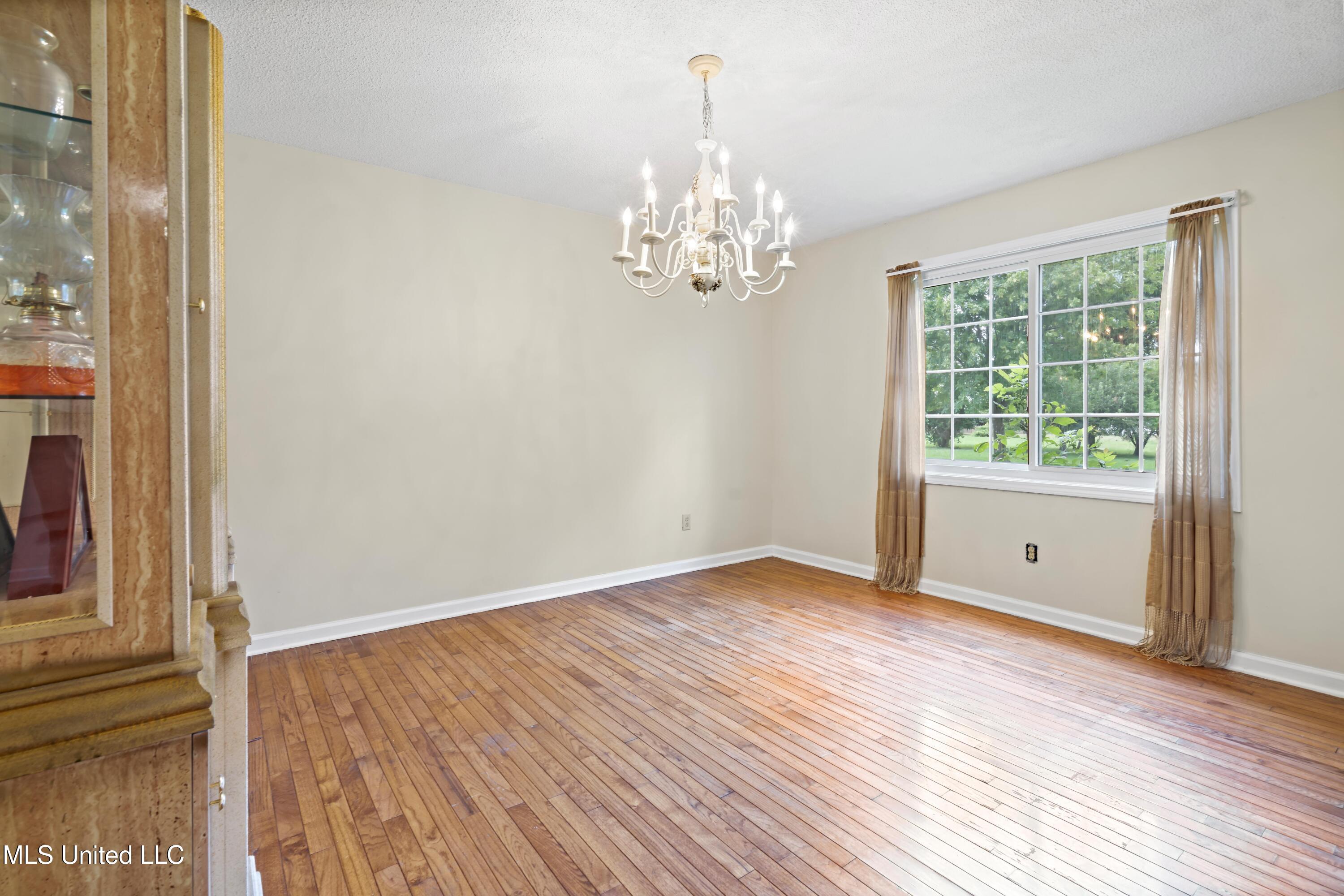 10668 Stark Acres Road Olive Branch, MS 38654 - Photo 7 of 22 Formal Dining Room