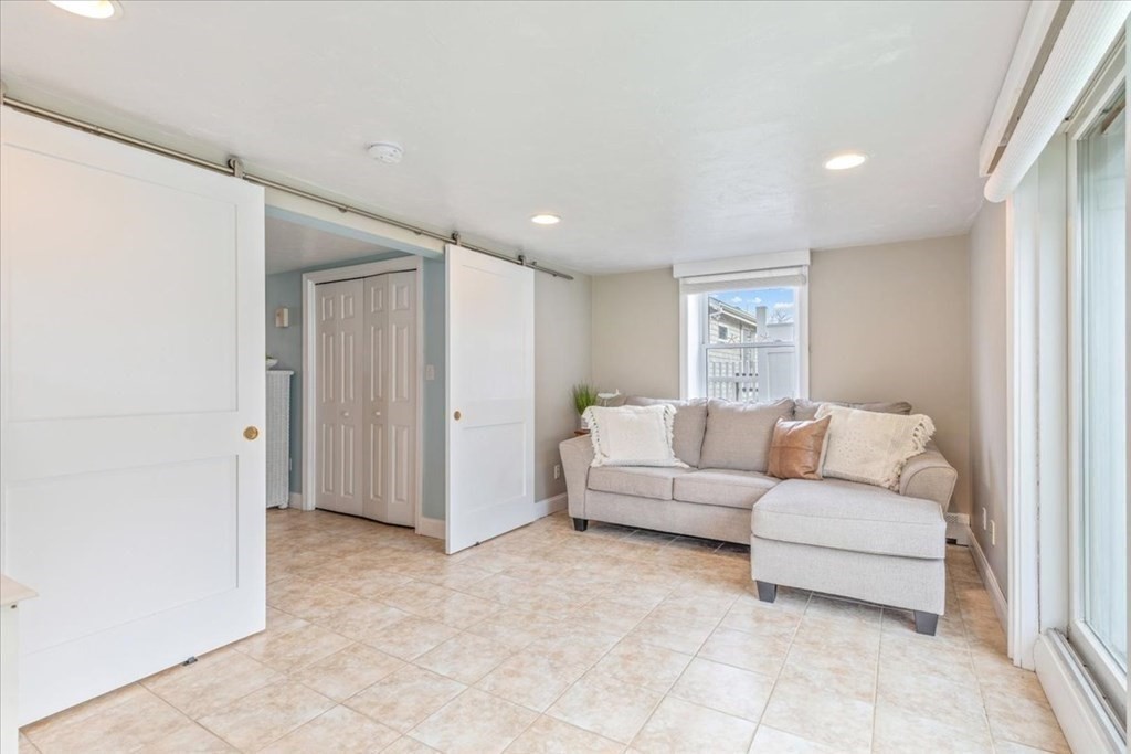 8 Feake Avenue Sandwich, MA 02563 - Photo 20 of 34 a living room with furniture and a window