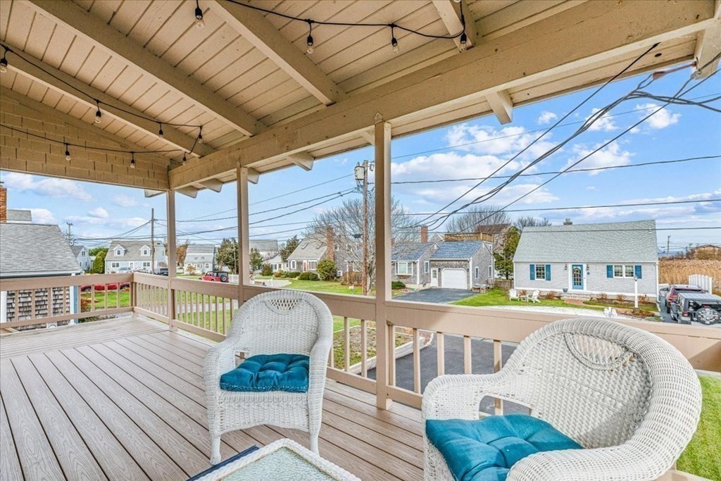 8 Feake Avenue Sandwich, MA 02563 - Photo 27 of 34 a balcony with furniture and a view of the back