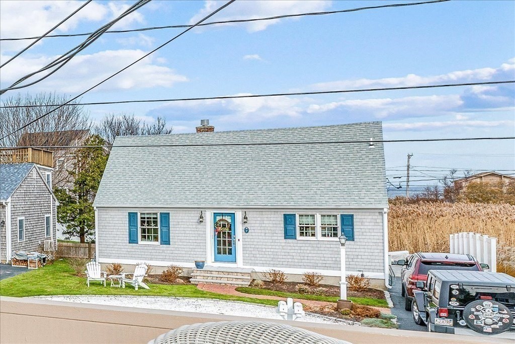 8 Feake Avenue Sandwich, MA 02563 - Photo 28 of 34 a front view of a house with a garden