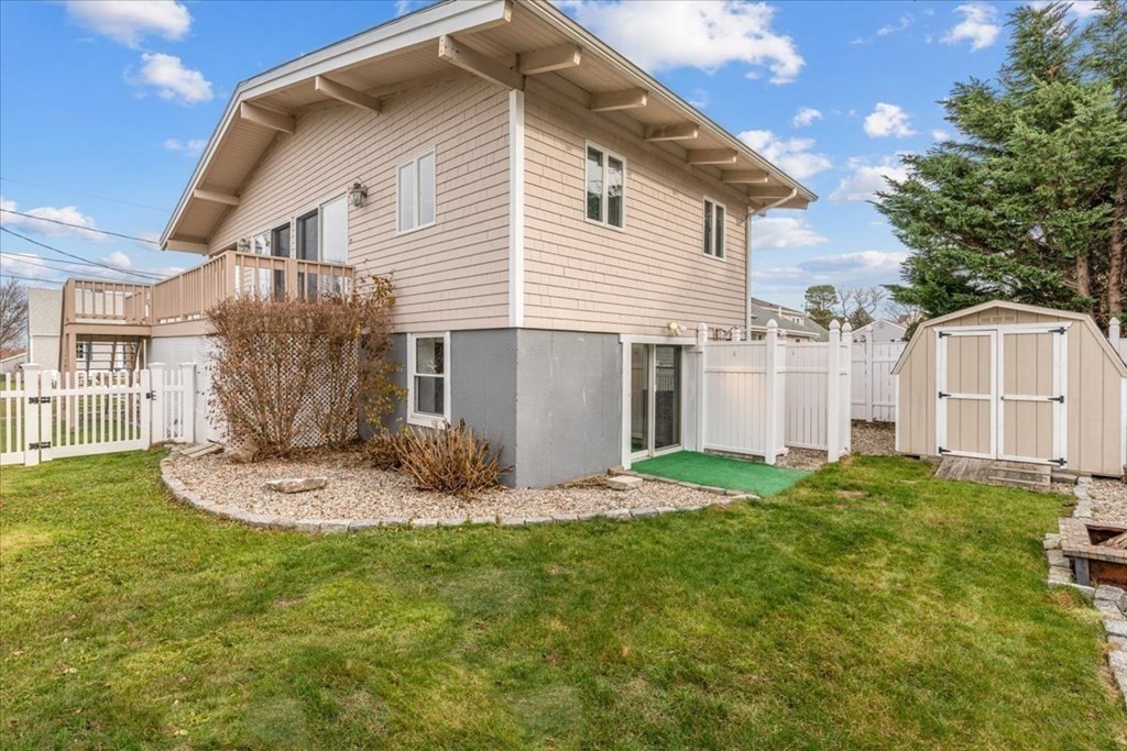 8 Feake Avenue Sandwich, MA 02563 - Photo 30 of 34 a view of a house with backyard