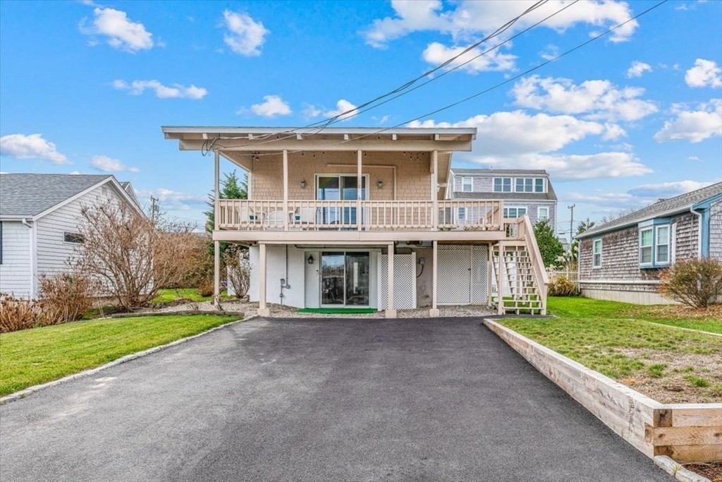 8 Feake Avenue Sandwich, MA 02563 - Photo 3 of 34 a front view of a house with garden