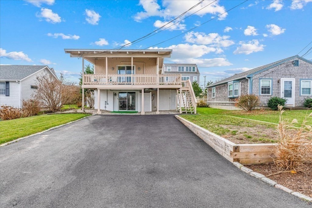 8 Feake Avenue Sandwich, MA 02563 - Photo 31 of 34 a view of an house with backyard and patio