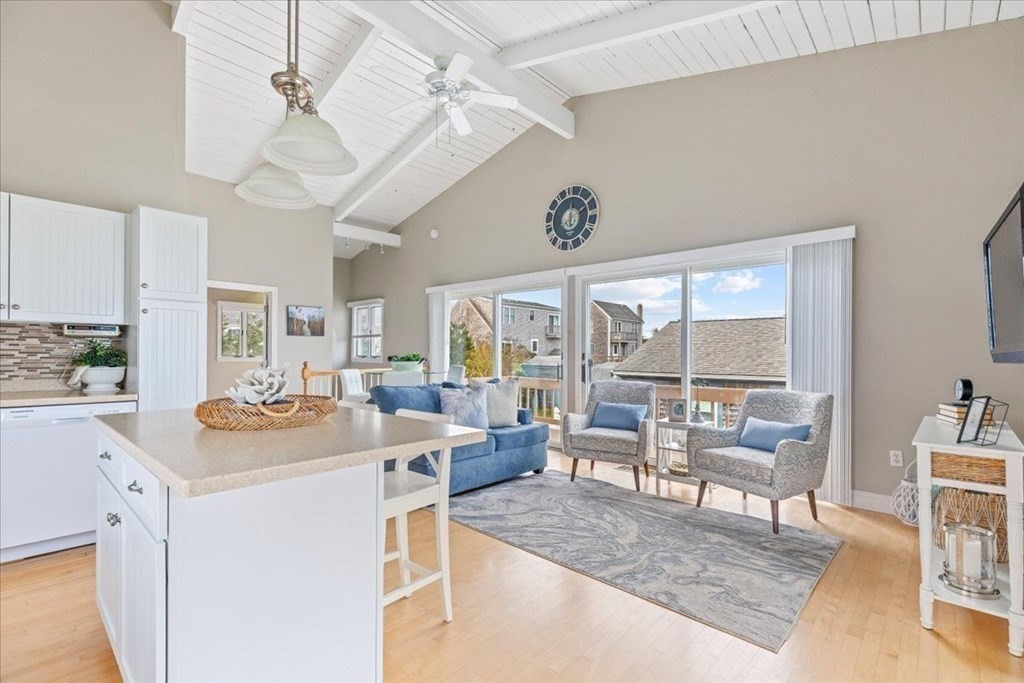 8 Feake Avenue Sandwich, MA 02563 - Photo 8 of 34 a view of a dining room with furniture large windows and wooden floor