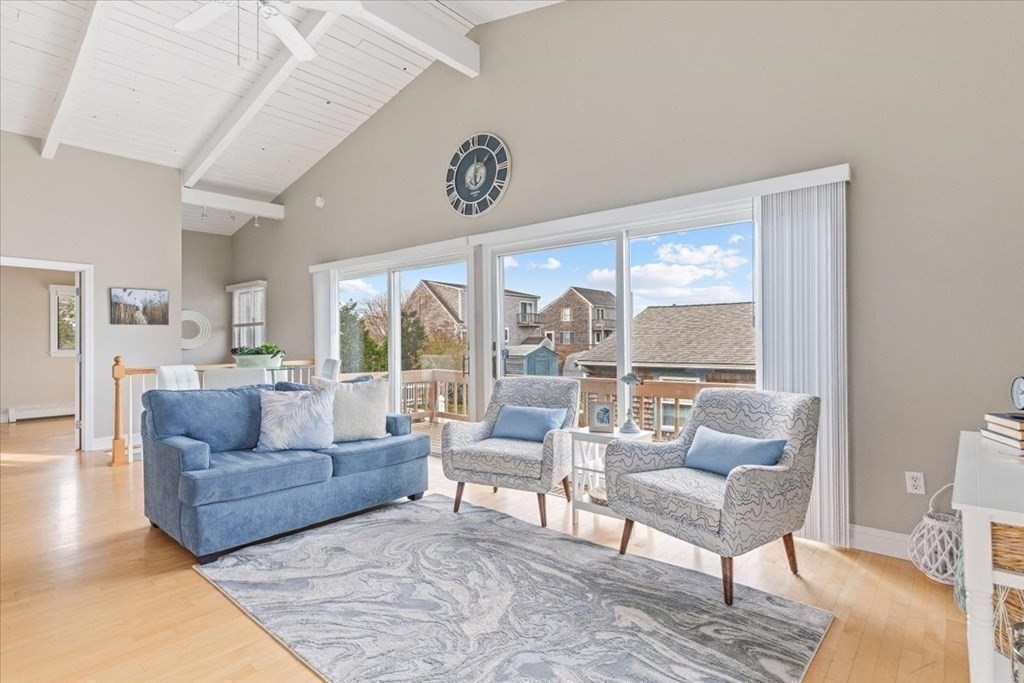 8 Feake Avenue Sandwich, MA 02563 - Photo 10 of 34 a living room with furniture and a large window