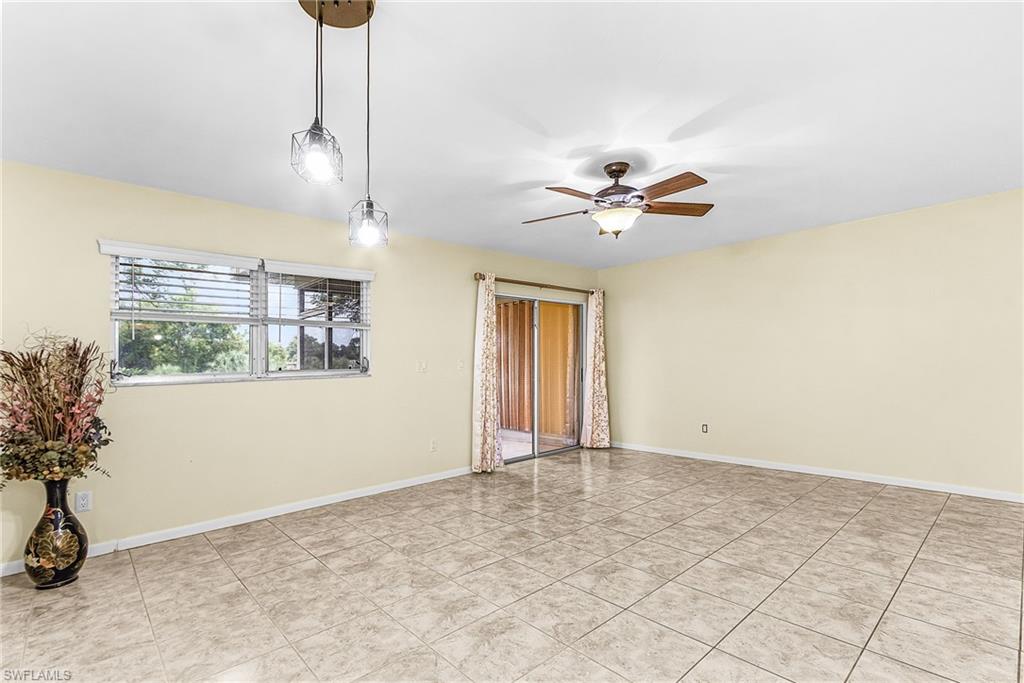 5917 Littlestone Court, Unit 115 North Fort Myers, FL 33903 - Photo 5 of 24 a view of an empty room with a window