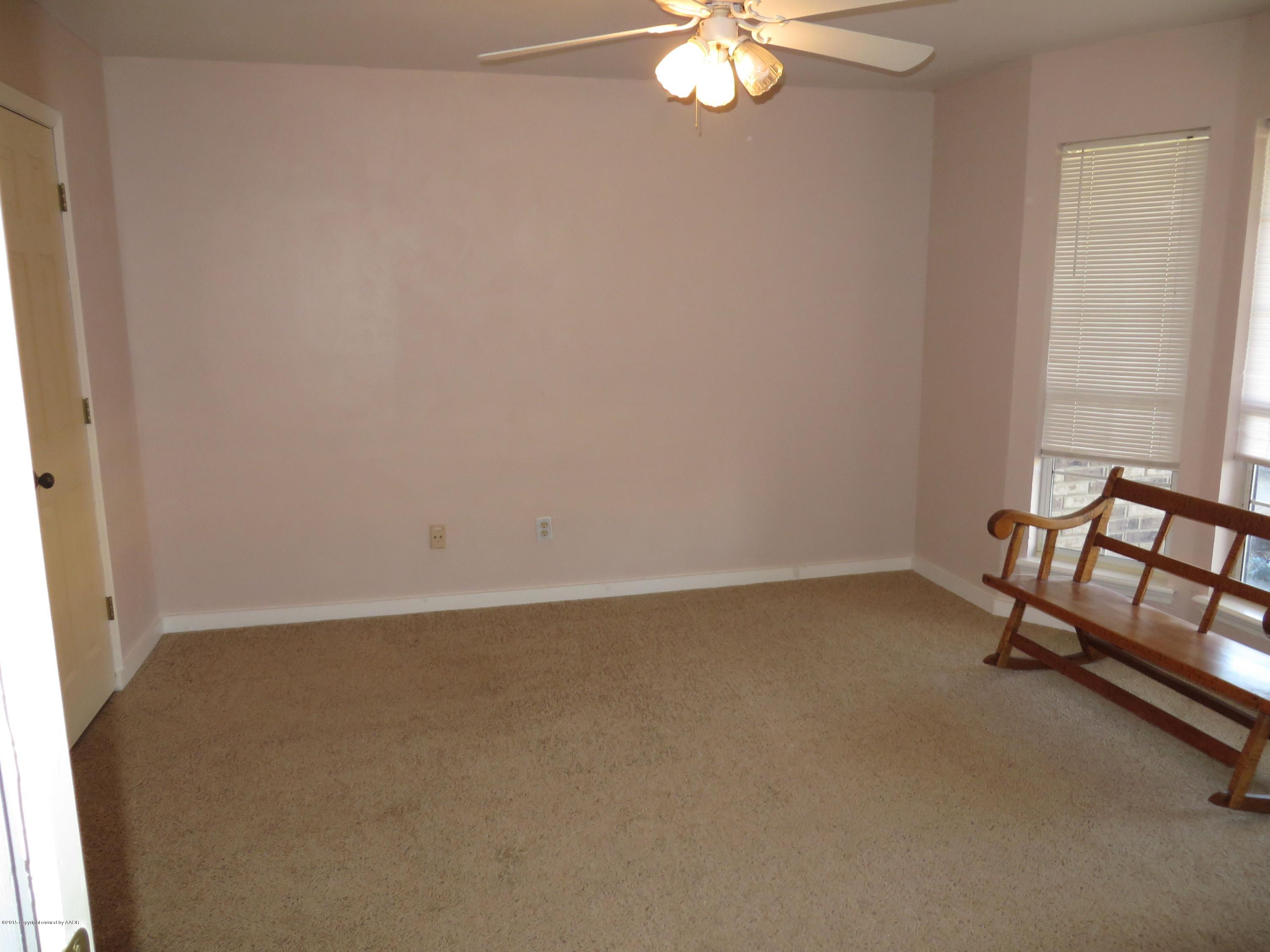 4213 Rincon Avenue Amarillo, TX 79110 - Photo 6 of 9 an empty room with windows