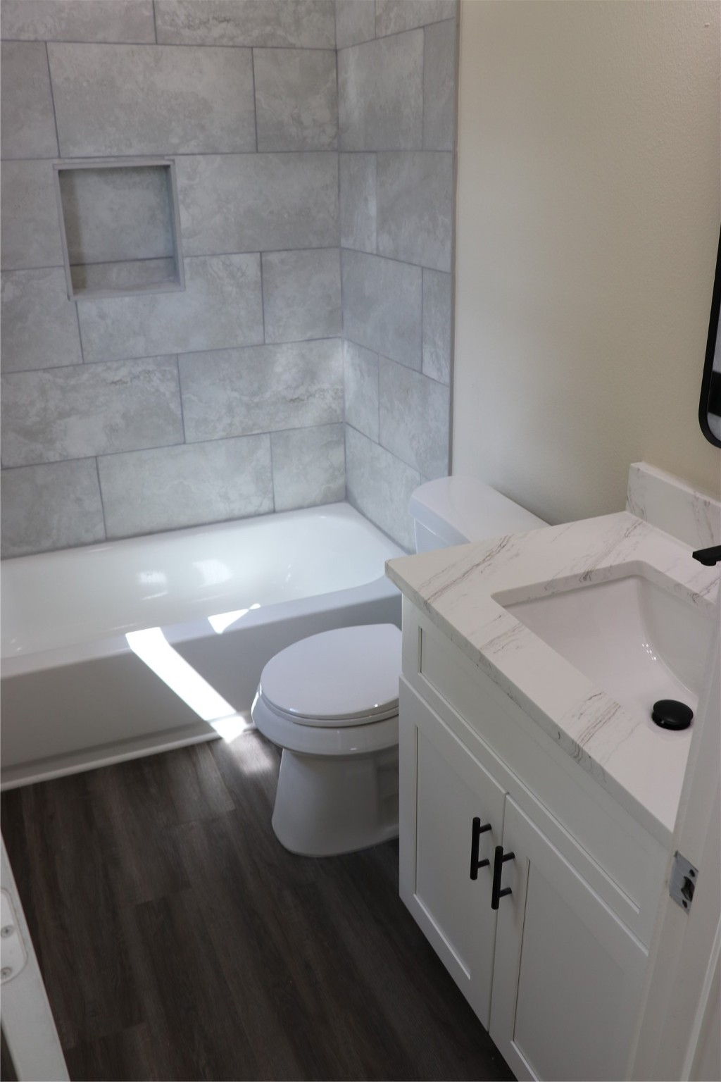 9441 Radio Road, Unit B Houston, TX 77075 - Photo 14 of 24 a bathroom with a sink and a toilet