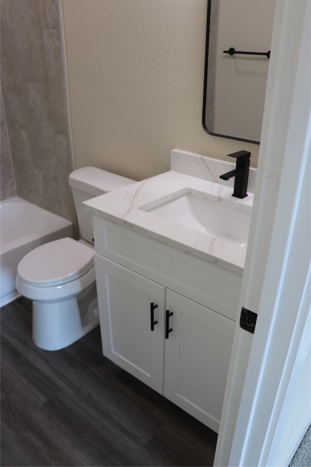 9441 Radio Road, Unit B Houston, TX 77075 - Photo 20 of 24 a bathroom with a sink and a mirror