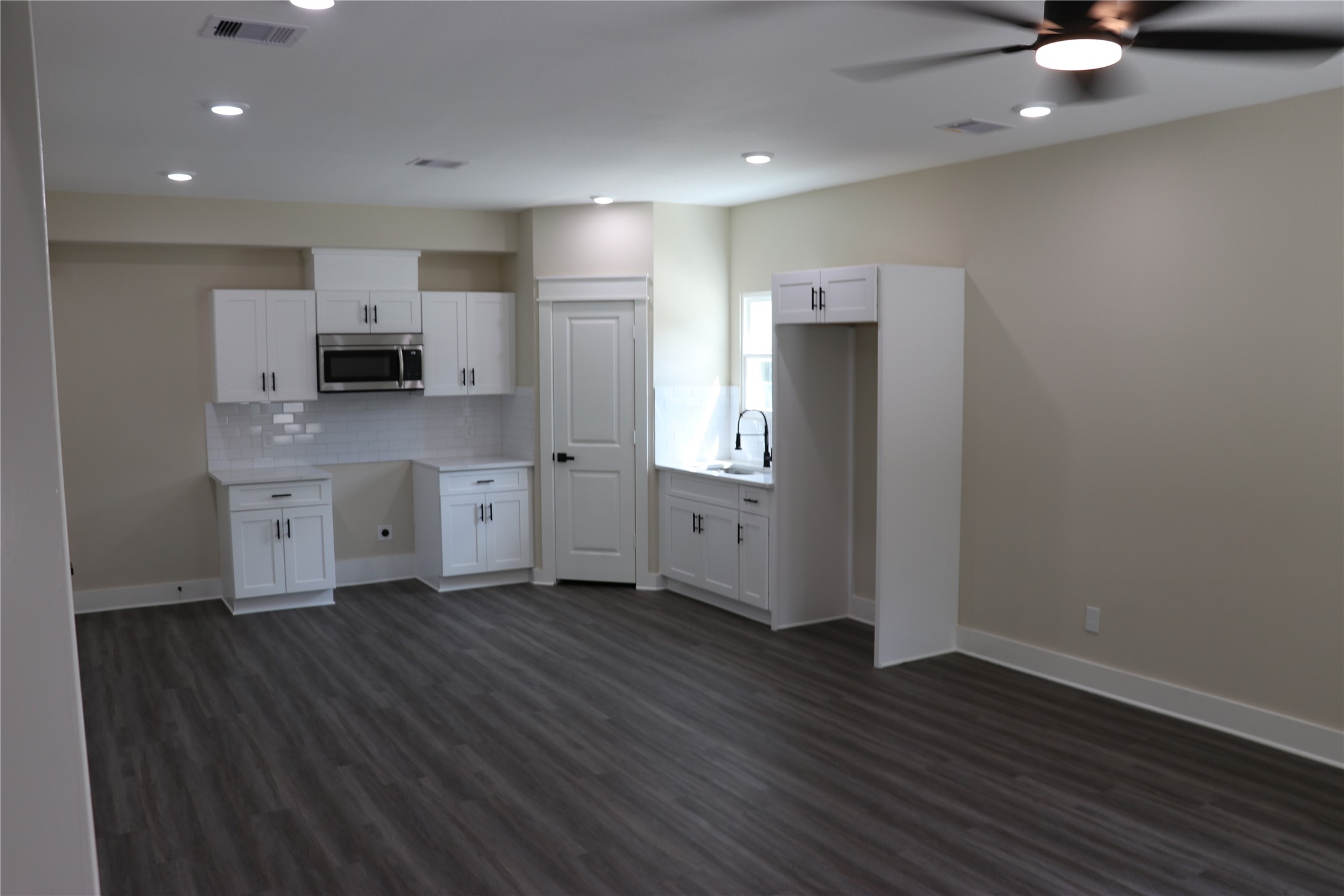 9441 Radio Road, Unit B Houston, TX 77075 - Photo 6 of 24 a kitchen with stainless steel appliances a refrigerator and a stove top oven
