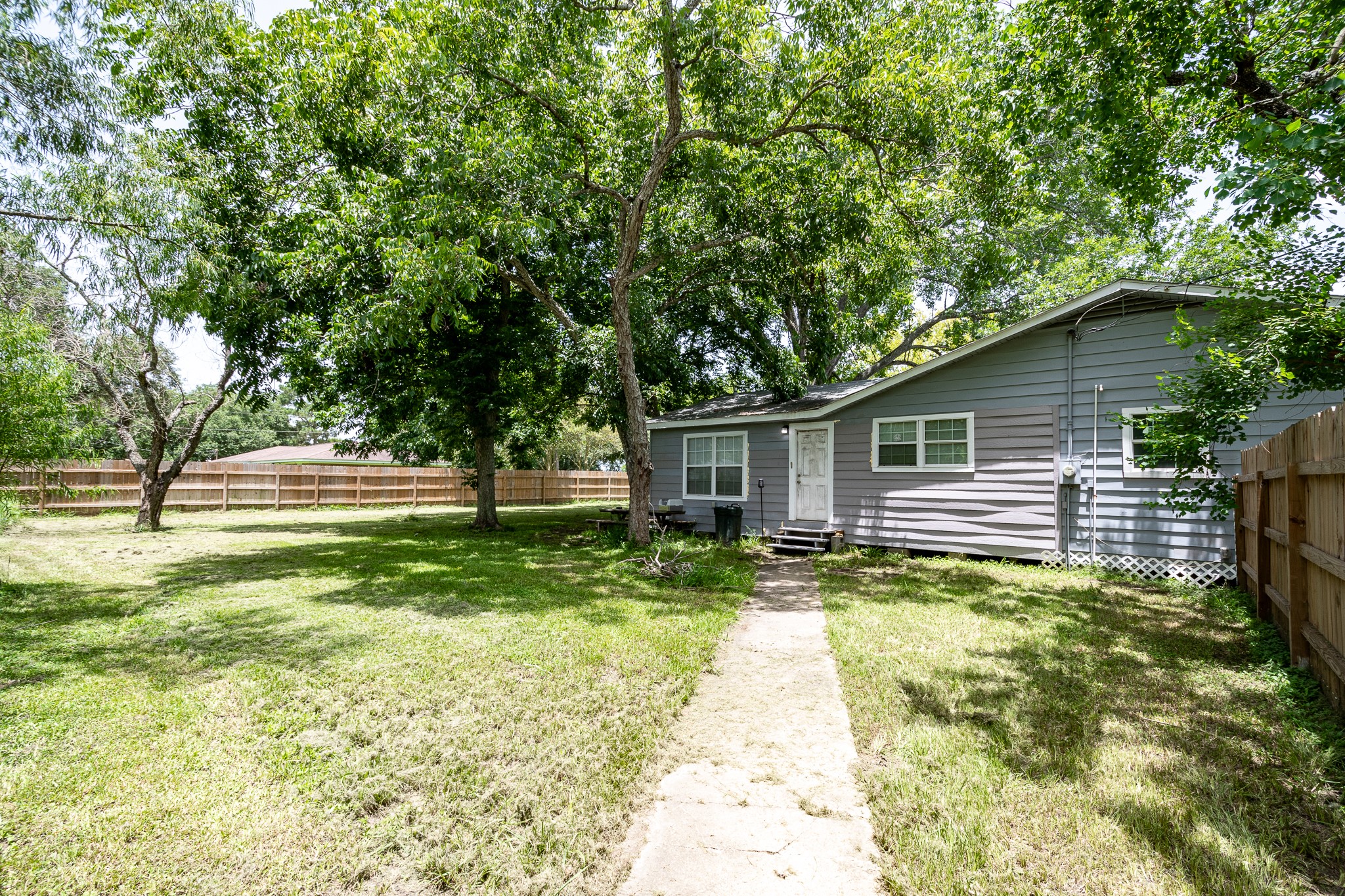 248 Fm-770 Liberty, TX 77575 - Photo 20 of 30 a view of a house with backyard and trees