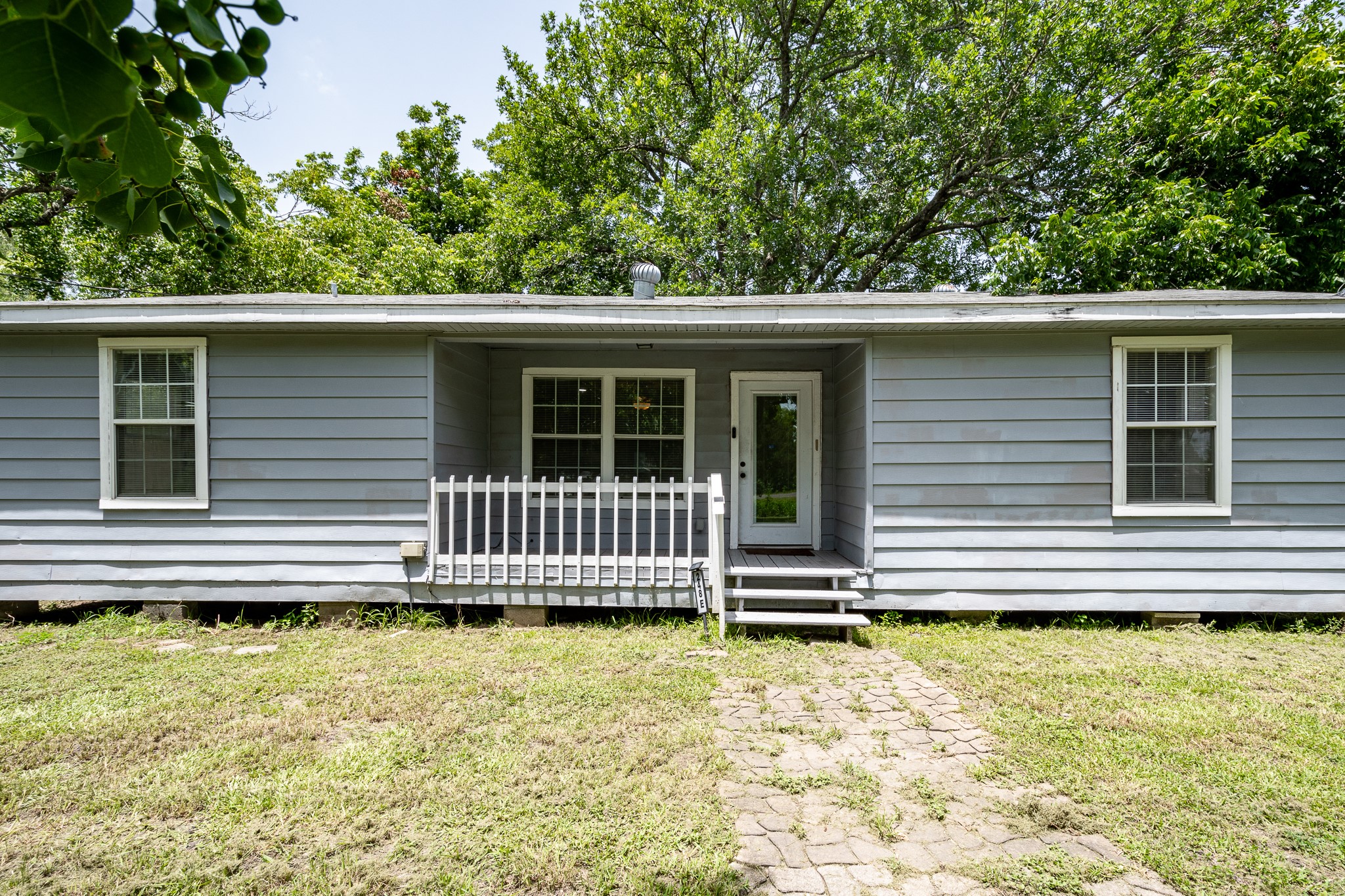 248 Fm-770 Liberty, TX 77575 - Photo 2 of 30 a view of a house with a swimming pool