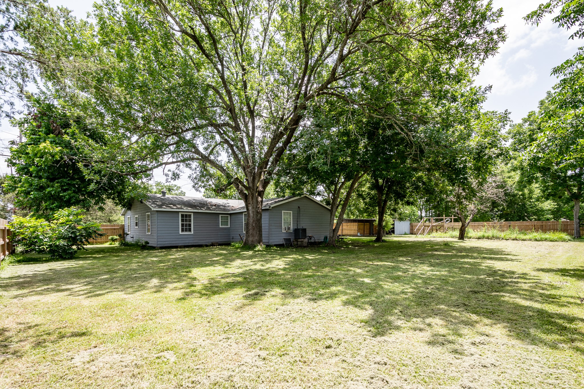 248 Fm-770 Liberty, TX 77575 - Photo 28 of 30 a view of a house with a big yard and large trees