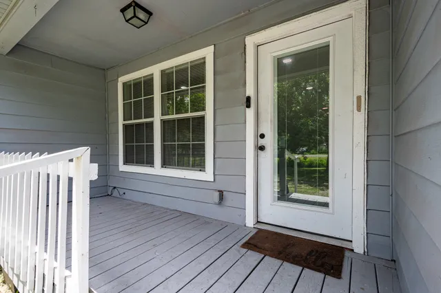 a view of a house with a porch