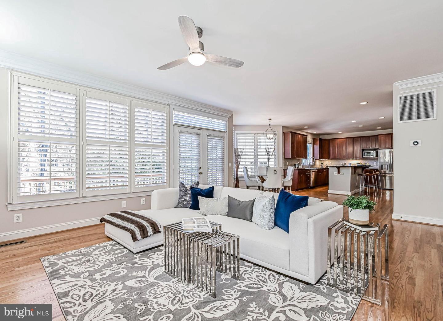 6516 76th Place Cabin John, MD 20818 - Photo 16 of 46 a living room with furniture and a large window
