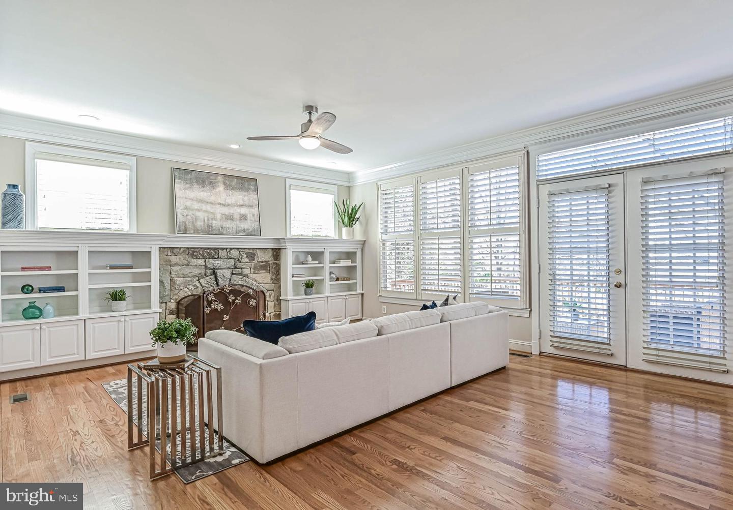 6516 76th Place Cabin John, MD 20818 - Photo 17 of 46 a living room with furniture and windows