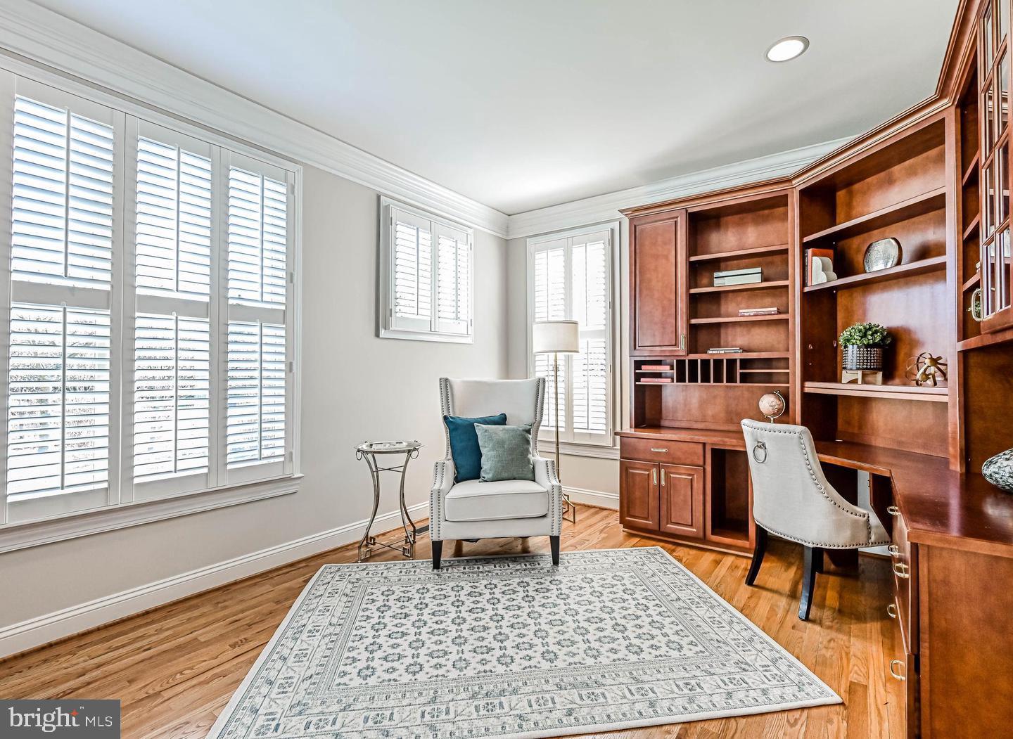 6516 76th Place Cabin John, MD 20818 - Photo 18 of 46 a living room with furniture and a rug